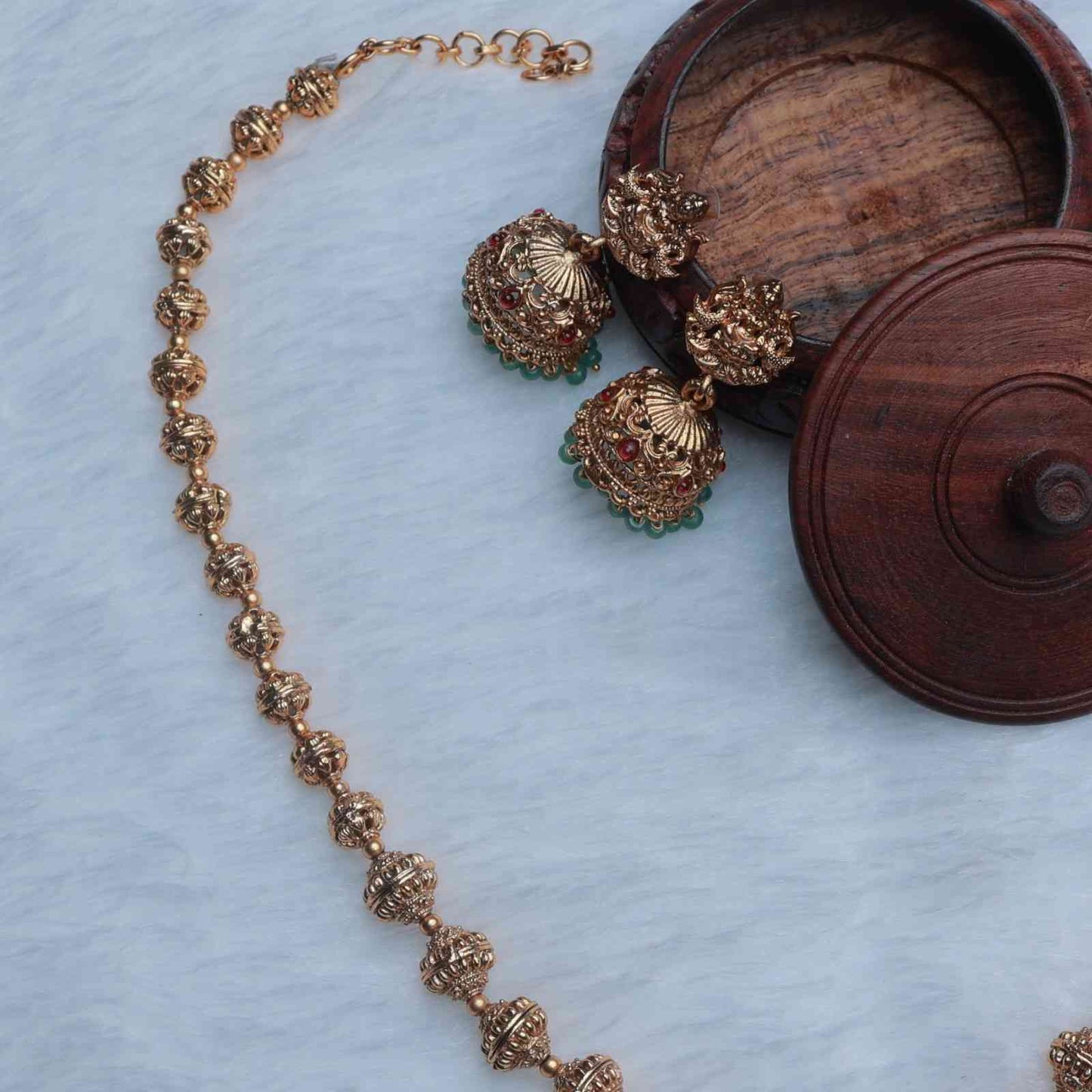 Middle Length Chettinad Haram Matte Finish Lakshmi Pendent with Green Beads H0034-CJ49