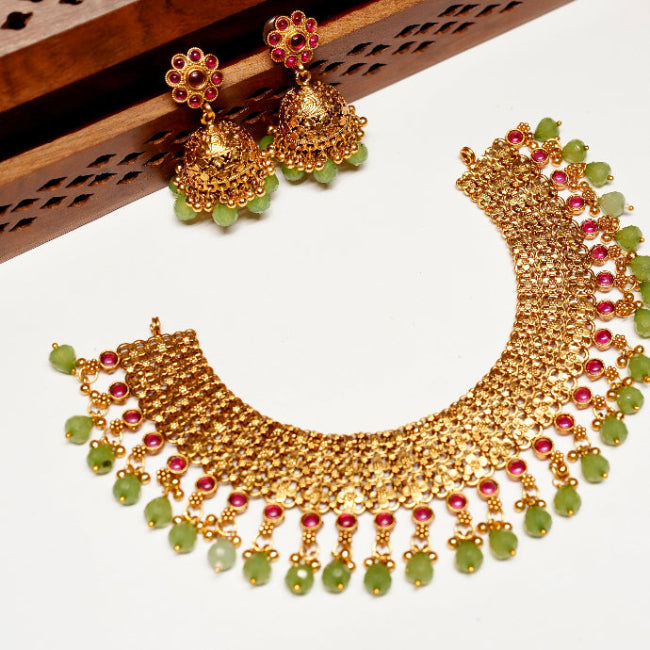Matte Finish Floral Pattern Bridal Necklace with green Beads and Red kemp Stones comes with matching jhumka  N0086-CJ53