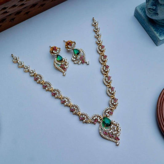 Premium Quality AD White Stone Floral Pattern necklace designed with Ruby red And emerald green Color stones Stone comes with Matching earrings N0148-CJ48