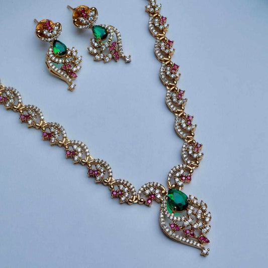 Premium Quality AD White Stone Floral Pattern necklace designed with Ruby red And emerald green Color stones Stone comes with Matching earrings N0148-CJ48