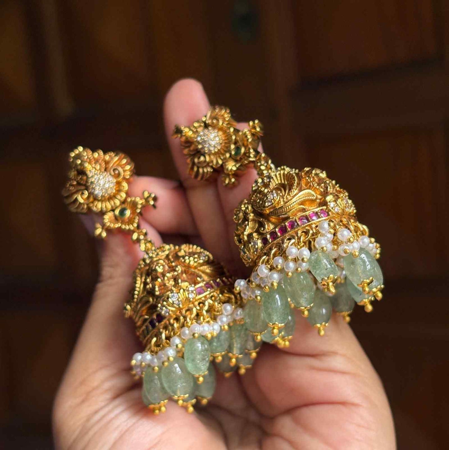 Premium Quality Gold Inspired Temple collection Bridal Jhumka 3d effect Peacock & Floral Pattern  Jhumka with Hanging Hydro Emerald beads and pearls J0061-CE100