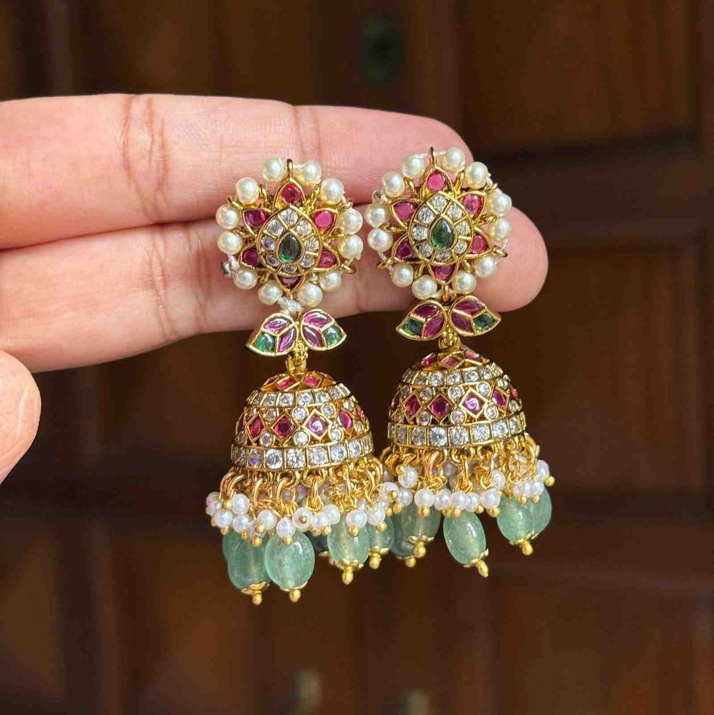 Premium Quality Gold Inspired  Bridal Jhumka designed with Ruby red stones Polka Diamonds  Floral Pattern Jhumka with Hanging Emerald Hydro beads and pearls J0063-CE50