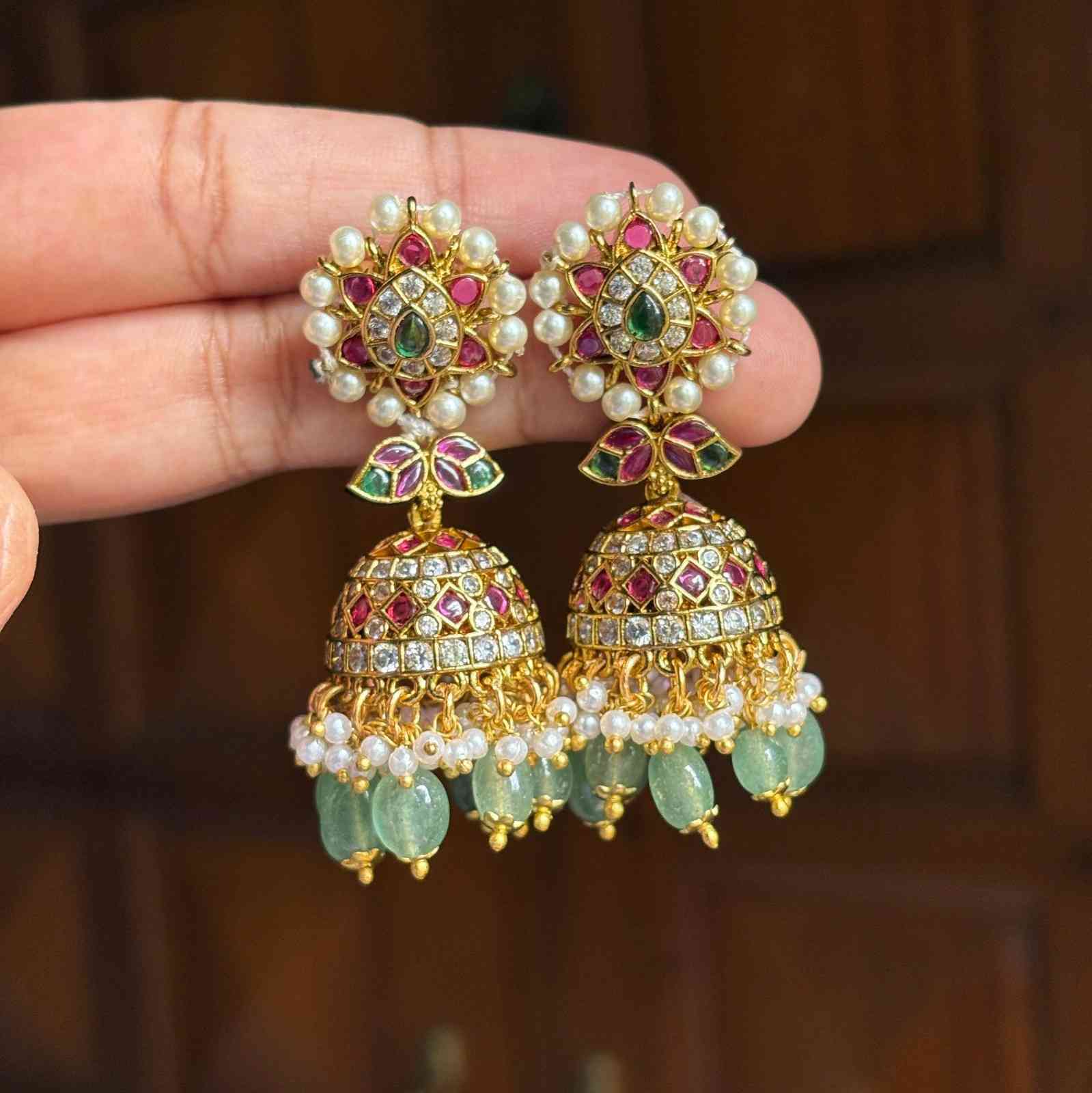 Premium Quality Gold Inspired  Bridal Jhumka designed with Ruby red stones Polka Diamonds  Floral Pattern Jhumka with Hanging Emerald Hydro beads and pearls J0063-CE50
