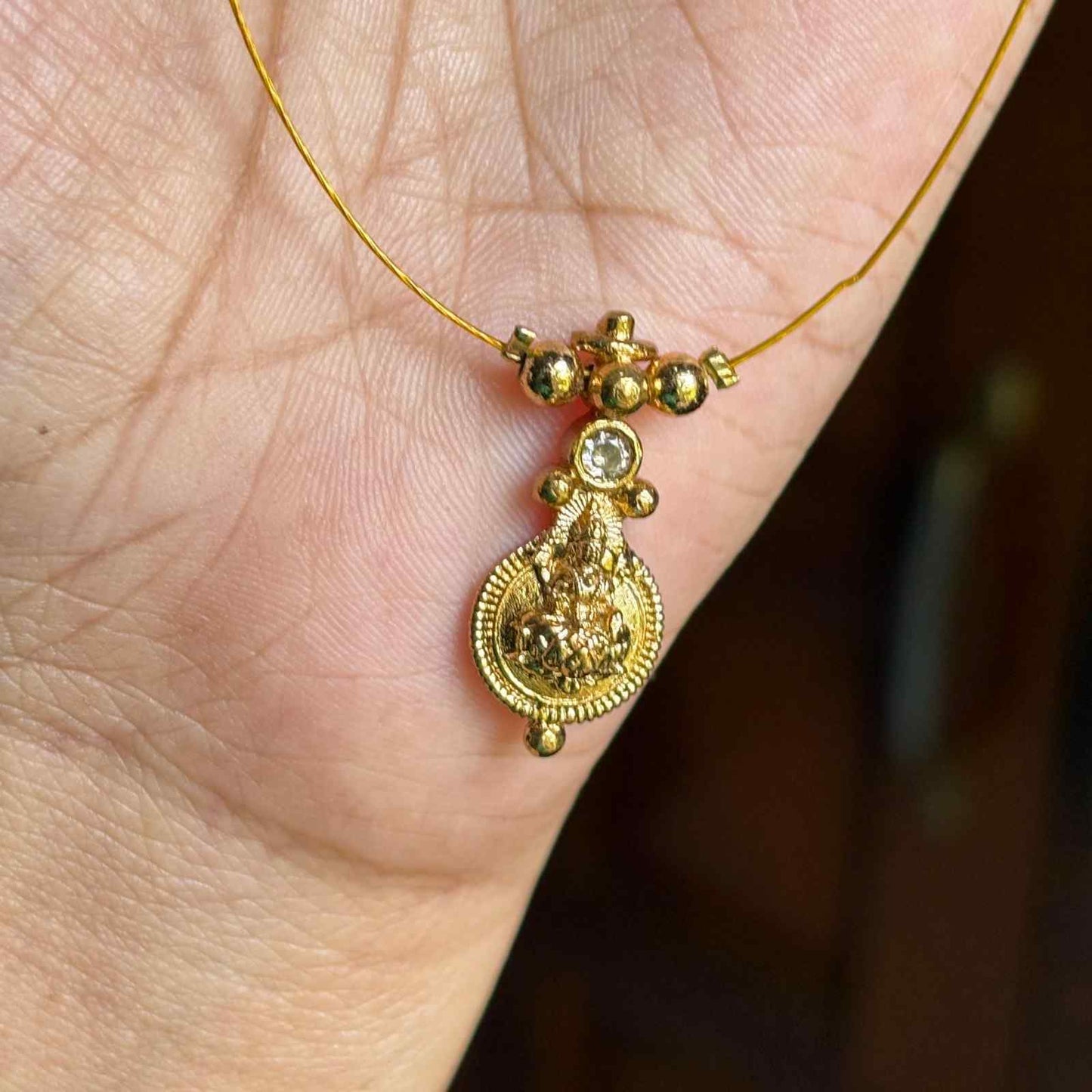 IN013 Invisible Chain with Lakshmi Pendent with No earrings