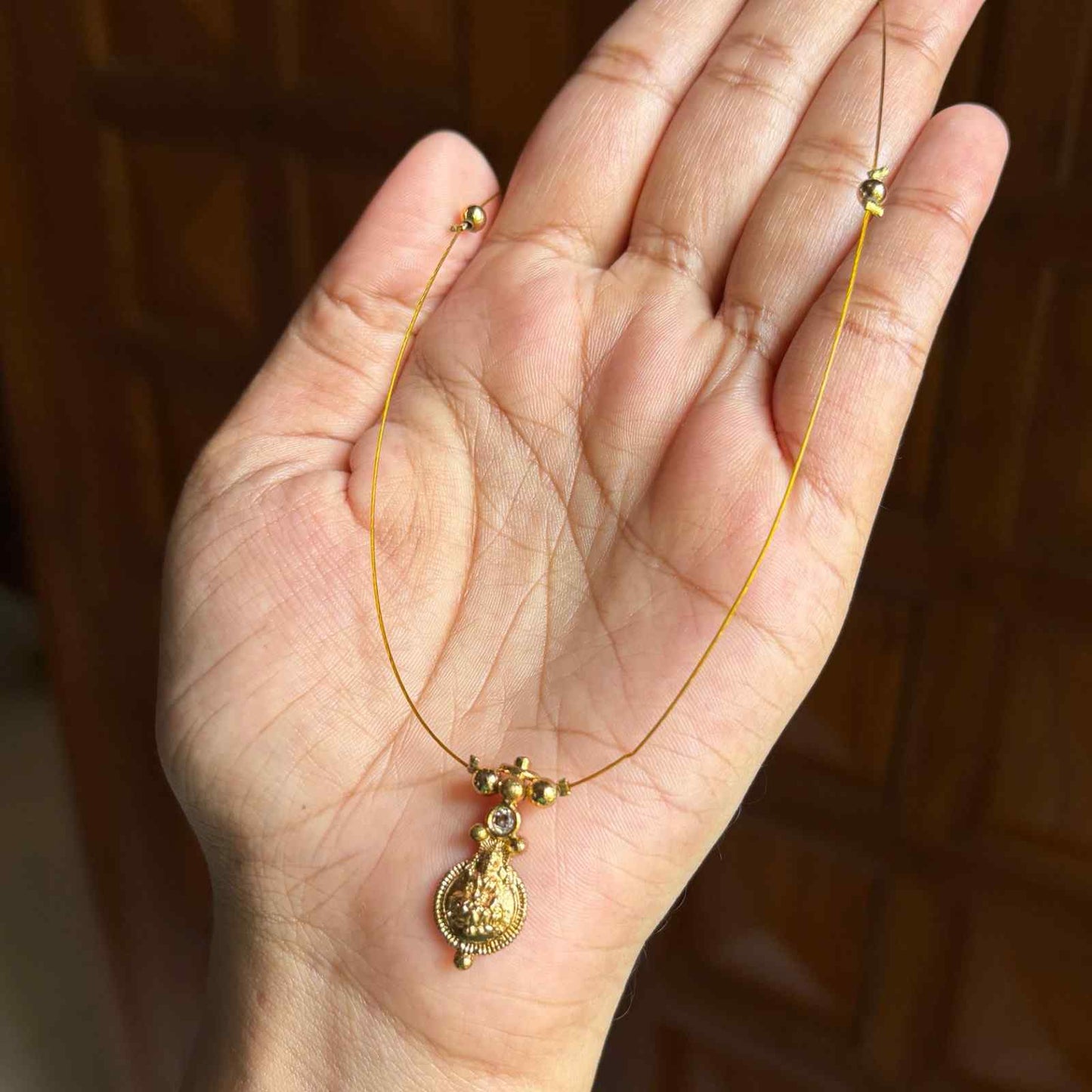IN013 Invisible Chain with Lakshmi Pendent with No earrings
