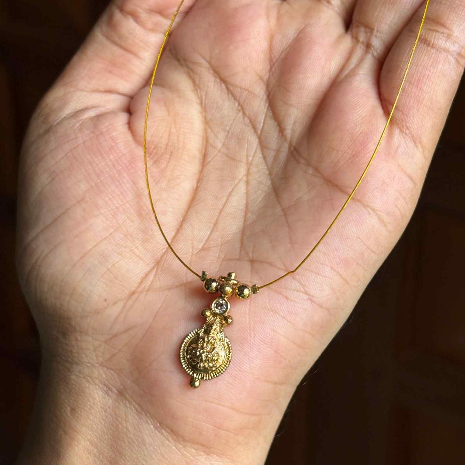 IN013 Invisible Chain with Lakshmi Pendent with No earrings