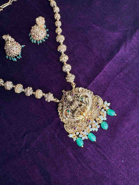 Middle Length Chettinad Haram Matte Finish Lakshmi Pendent with Green Beads H0036-CJ49