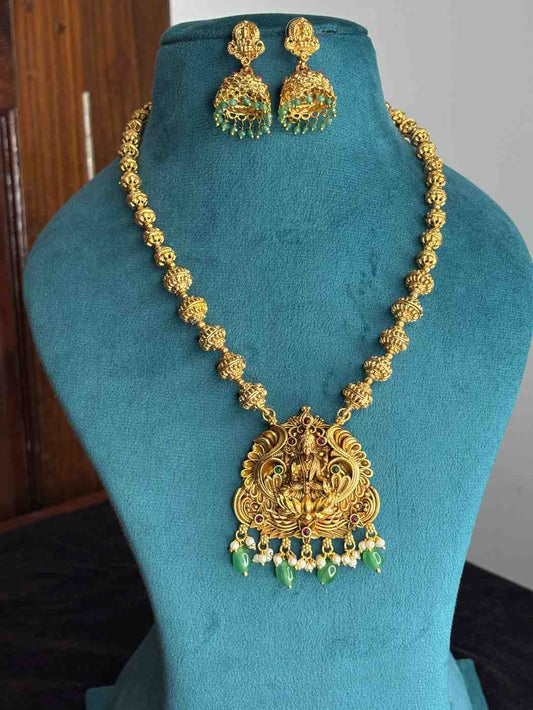 Middle Length Chettinad Haram Matte Finish Lakshmi Pendent with Green Beads H0036-CJ49