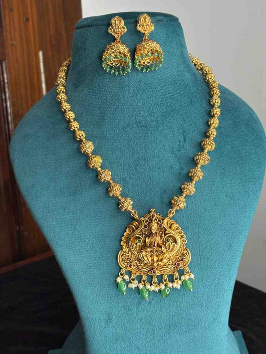 Middle Length Chettinad Haram Matte Finish Lakshmi Pendent with Green Beads H0036-CJ49
