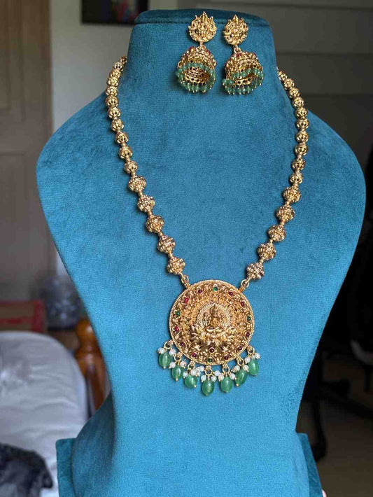 Middle Length Chettinad Haram Matte Finish Lakshmi Pendent with Green Beads H0034-CJ49
