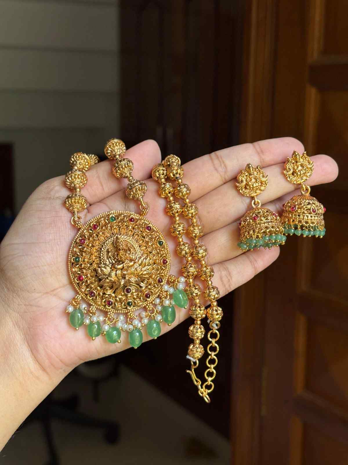 Middle Length Chettinad Haram Matte Finish Lakshmi Pendent with Green Beads H0034-CJ49