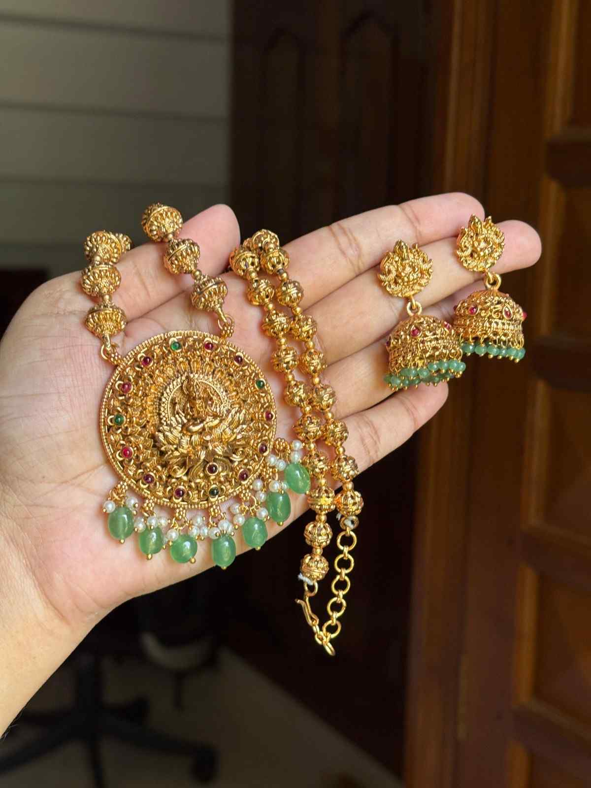 Middle Length Chettinad Haram Matte Finish Lakshmi Pendent with Green Beads H0034-CJ49