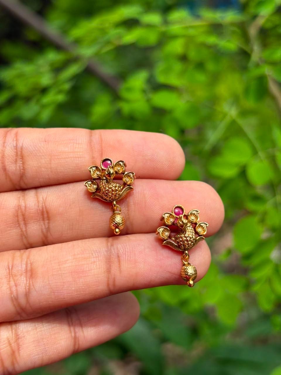 J0193 Peacock Stud with ruby red stone