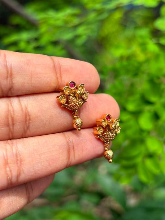 J0193 Peacock Stud with ruby red stone
